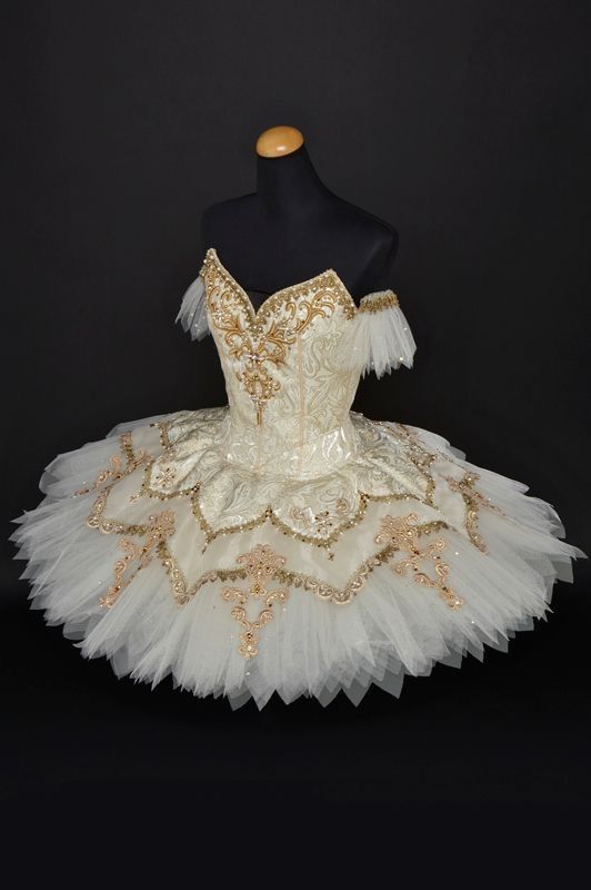 White ballet tutu with gold embellishments